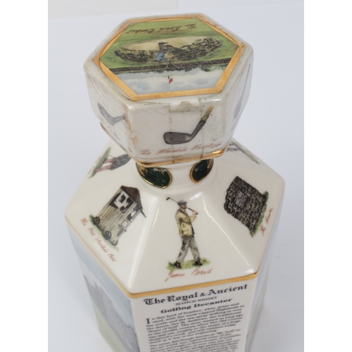 387 - A sealed litre decanter of The Royal & Ancient 20 year old Scotch whisky - decorated with scenes of ... 