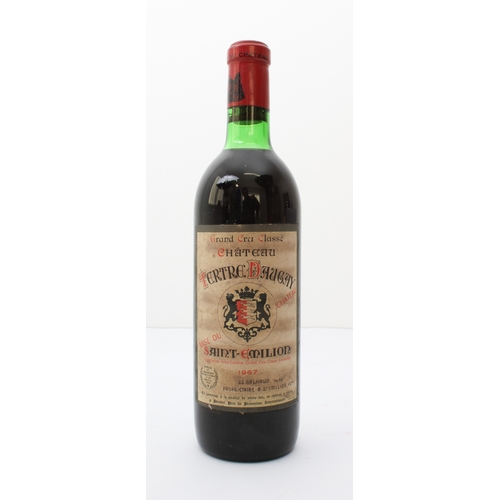 A Bottle Of Chȃteau Tertre Daugay Saint-emilion 1967 Grand Cru Classé.