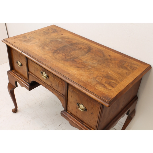 430 - A George I style walnut lowboy or dressing table - probably early 20th century, using earlier elemen... 