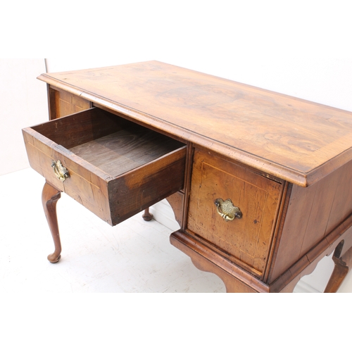 430 - A George I style walnut lowboy or dressing table - probably early 20th century, using earlier elemen... 