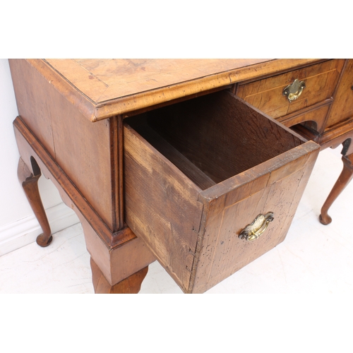 430 - A George I style walnut lowboy or dressing table - probably early 20th century, using earlier elemen... 