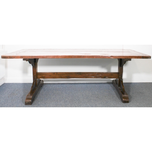 456 - A fine teak refectory-style dining table - the richly coloured, cleated, five-plank top on trestle e... 