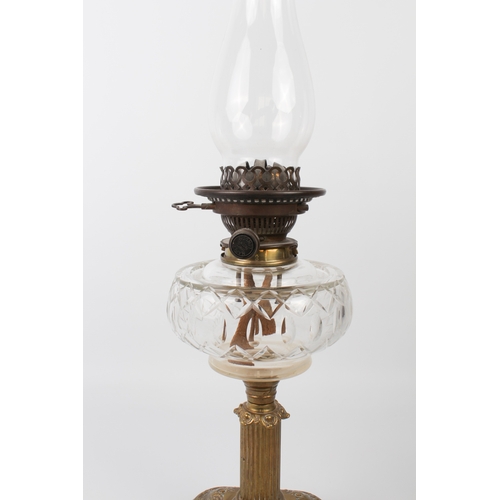 541 - An Edwardian brass and cut glass oil lamp by Hinks & Sons for Maple of London, the rounded square ba... 