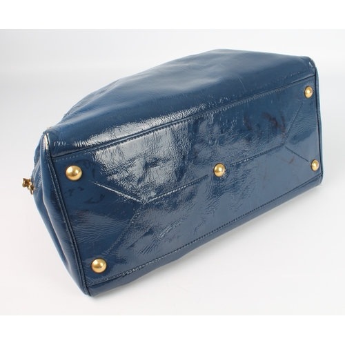 574 - A blue patent leather shoulder bag by Yves Saint Laurent - with brushed gold toned hardware, two bar... 