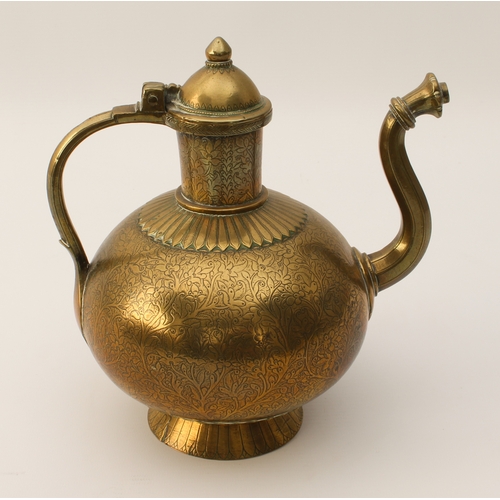 584 - Five pieces of brassware:
 a heavy Indian teapot of flattened globular form with tower-shaped neck a... 