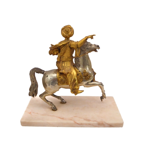 586 - A bronze, silvered and parcel gilt figure of a Turk on horseback - probably early 20th century, seat... 