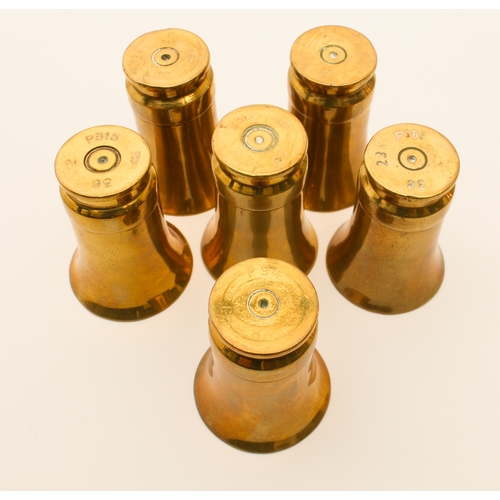 598 - A set of six WW2 trench art beakers formed from 25 mm shell cases (5.5 cm high, rim diam. 3.9 cm) an... 