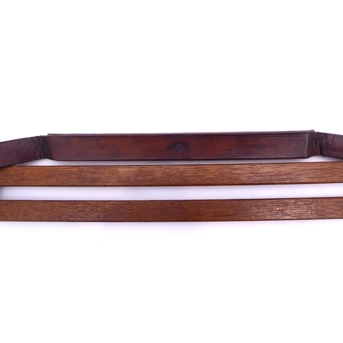 622 - A scarce oak, brass and leather game carrier - early 20th century, the leather strap stamped 'A. Bul... 