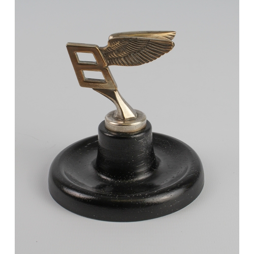 636 - A Bentley presentation mascot mounted as a paperweight. Presentation mascots were given by Bentley o... 