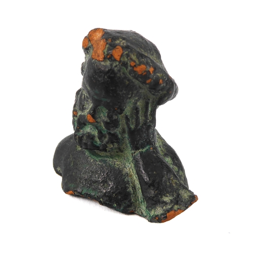 643 - A bronze glazed terracotta bust of Christ, possibly a pilgrim piece, 4 cm high