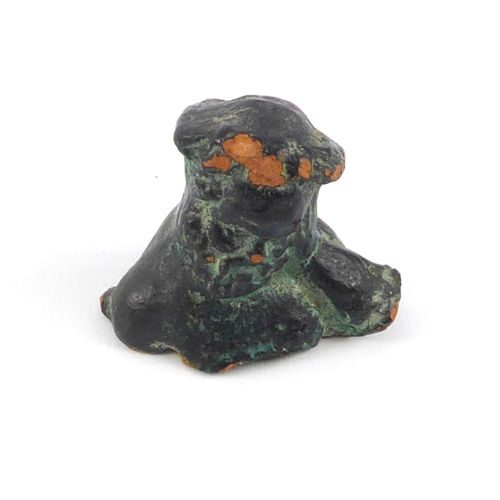 643 - A bronze glazed terracotta bust of Christ, possibly a pilgrim piece, 4 cm high