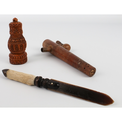 649 - A treen barrel tap 18 cm), horn knife (20 cm) and a carved and turned coquilla nut pepper caster (10... 