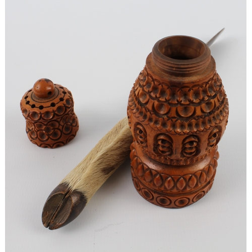 649 - A treen barrel tap 18 cm), horn knife (20 cm) and a carved and turned coquilla nut pepper caster (10... 