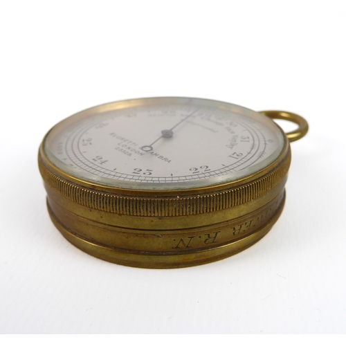 655 - A brass cased pocket barometer by Negretti & Zambra - no.25328, 5 cm diameter; together with a nicke... 