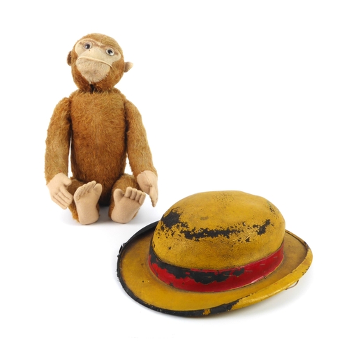 661 - A mohair 'Yes-No' monkey and a ventriloquist's hat