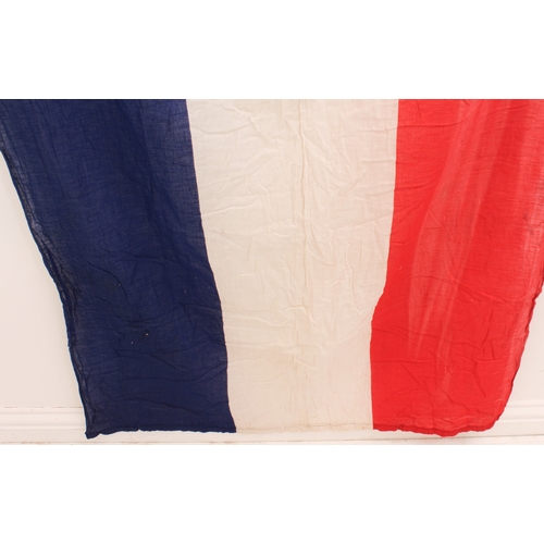 667 - A vintage tricolour banner (2.2 x 1.0 m) and 9.5 metres of matching pennant bunting (22 pennants, ea... 