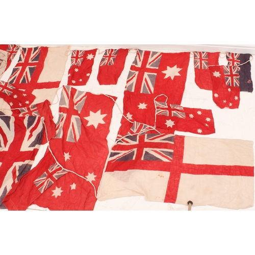 668 - A vintage Union Jack (2.6 x 1.32 m) and 9.2 m of 1920s bunting. The bunting with 19 flags of varying... 