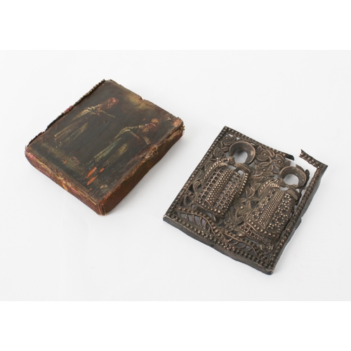 674 - A miniature Russian Orthodox icon - probably 19th century, depicting two saints, the pierced silver ... 