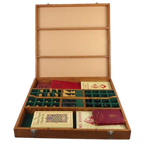 678 - A custom-made chess boxset, the board secured by toggle-latches and serving as a lid. The interior f... 