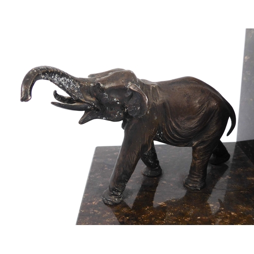 681 - A pair of cast white metal and marble elephant bookends - late 20th century, the elephants modelled ... 