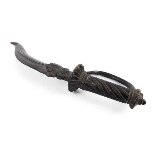 690 - An Indian ornamental bronze kris-type dagger - 20th century, with very dark brown patination, 27.5 c... 