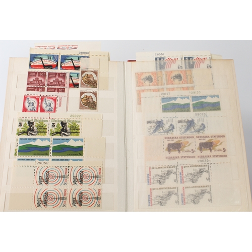 699 - A large collection of stamps:
 a stock album containing 71 USA blocks of four (mostly 1960-1980);
 2... 