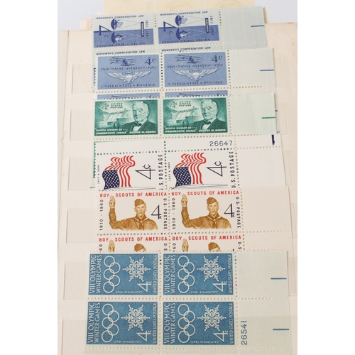 699 - A large collection of stamps:
 a stock album containing 71 USA blocks of four (mostly 1960-1980);
 2... 