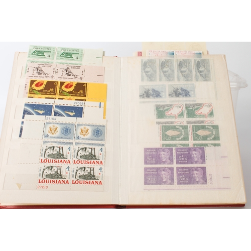 699 - A large collection of stamps:
 a stock album containing 71 USA blocks of four (mostly 1960-1980);
 2... 