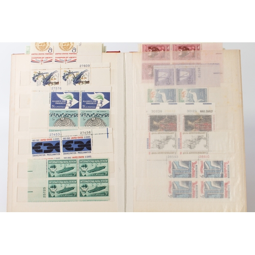 699 - A large collection of stamps:
 a stock album containing 71 USA blocks of four (mostly 1960-1980);
 2... 