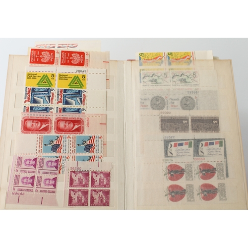 699 - A large collection of stamps:
 a stock album containing 71 USA blocks of four (mostly 1960-1980);
 2... 