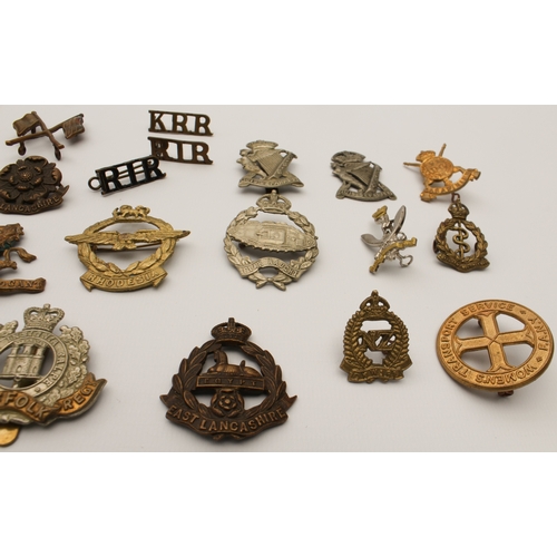 703 - Twenty British Army cap and other badges, mostly first half of the 20th century:
 The Cambridgeshire... 