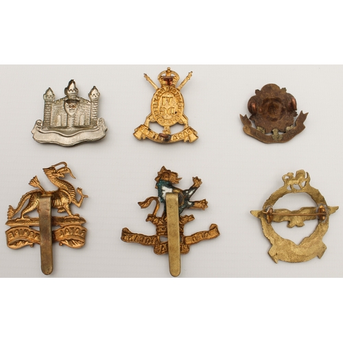 703 - Twenty British Army cap and other badges, mostly first half of the 20th century:
 The Cambridgeshire... 