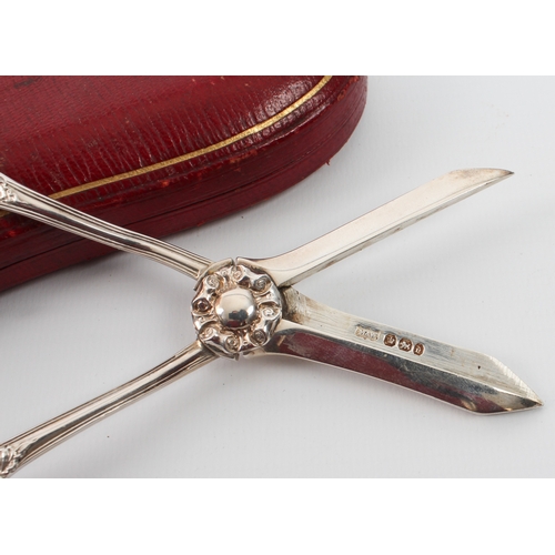 153 - A cased pair of late Victorian silver grape scissors - Mappin & Webb, Sheffield 1896, with rose-form... 