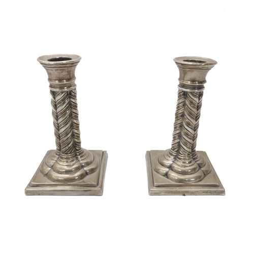 164 - A pair of Edwardian silver cluster column candlesticks - Martin, Hall & Co., Sheffield 1904, on step... 