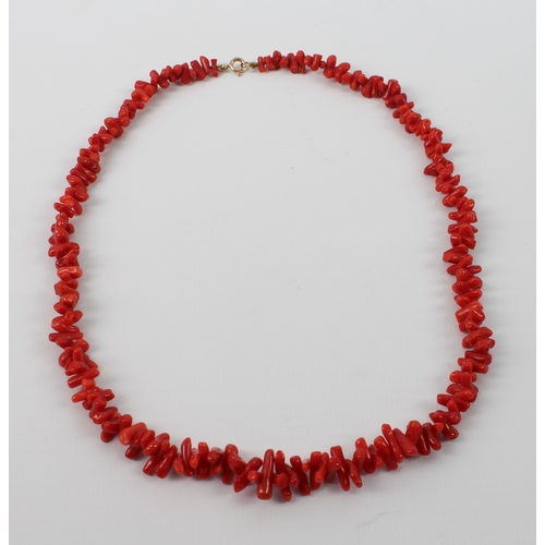 192 - A small collection of vintage coral and moonstone necklaces - comprising a graduated moonstone bead ... 