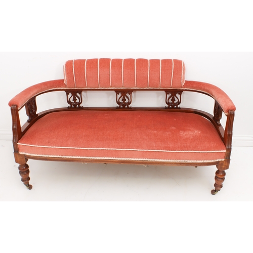 462 - An Edwardian walnut three-piece parlour suite - comprising a two-seater sofa and a pair of tub armch... 