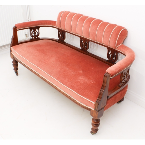 462 - An Edwardian walnut three-piece parlour suite - comprising a two-seater sofa and a pair of tub armch... 