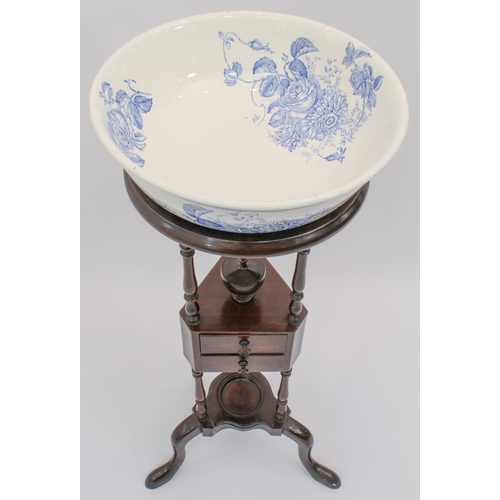 465 - A George III style mahogany washstand - second half 20th century, the circular bowl frame raised on ... 