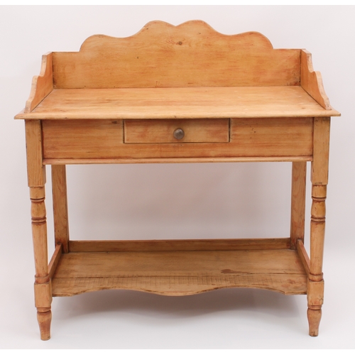 466 - A Victorian waxed pine washstand - with shaped three-quarter gallery, single frieze drawer and pot s... 