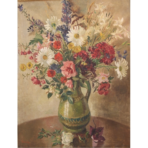 298 - John Thomas Young Gilroy (1898-1985)
 Still life of garden flowers in a green glazed jug
 oil on can... 