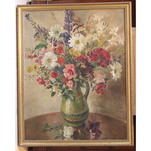 298 - John Thomas Young Gilroy (1898-1985)
 Still life of garden flowers in a green glazed jug
 oil on can... 