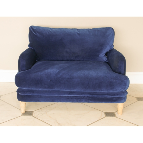 500 - A Loaf Squisheroo love seat - upholstered in Royal blue velvet, raised on turned limed oak feet, 115... 