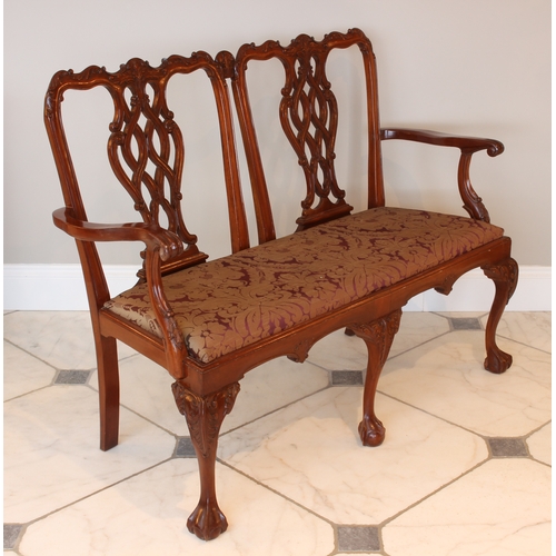 522 - A George II style mahogany chair back settee - late 20th century, in the Chippendale manner, the dou... 