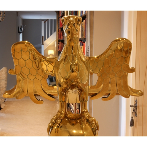 600 - An impressive brass eagle lectern - early 20th century, the eagle with wings outstretched to form th... 