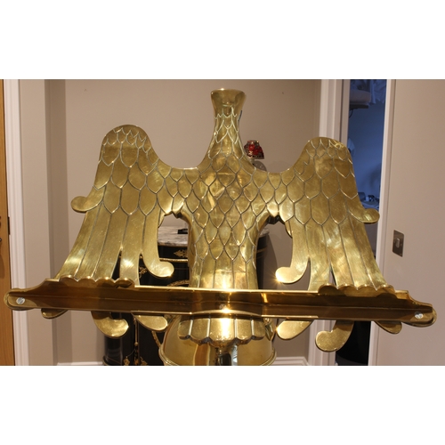 600 - An impressive brass eagle lectern - early 20th century, the eagle with wings outstretched to form th... 