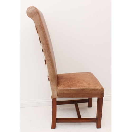 455 - A set of six rollback tan leather and cow hide dining chairs by Indigo of Matlock.