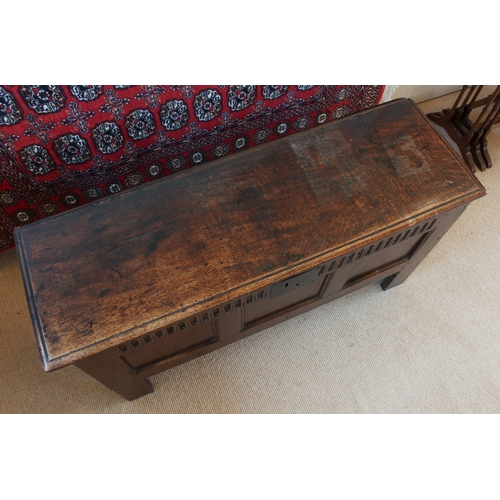 448 - A late 17th century boarded oak chest - the moulded, single plank top with later hinges, over plain ... 