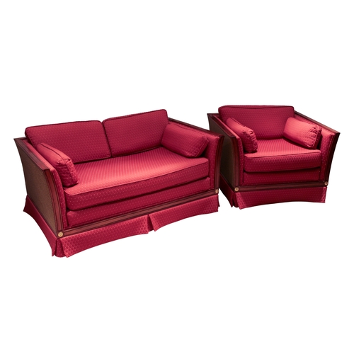 421 - A Harrods mahogany bergere style showframe settee and matching armchair - the flared, angular frames... 