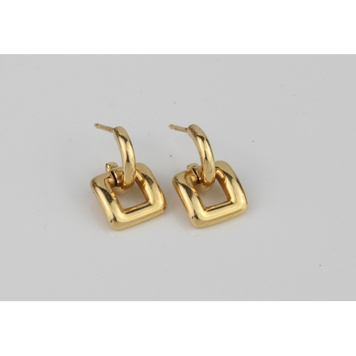 180 - A pair of 18ct yellow gold earrings signed 'Tiffany'  - of buckle shape, suspended from half-hoops, ... 