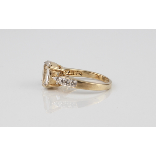 213 - A 9ct gold ring set with a large white stone - hallmarked Birmingham 2008, size N.